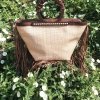 koja braided leather bag and wooden handles with fringes