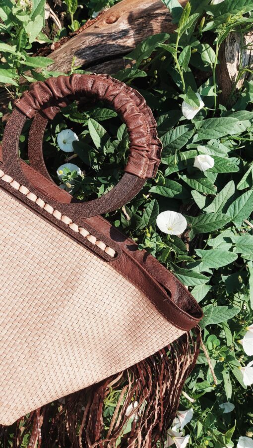 koja braided leather bag and wooden handles with fringes